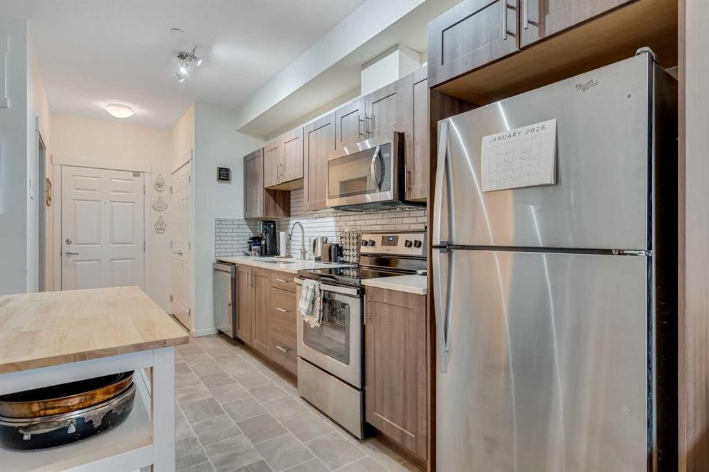 3209-215 Legacy Boulevard Se, Calgary, AB - Indoor Photo Showing Kitchen With Stainless Steel Kitchen
