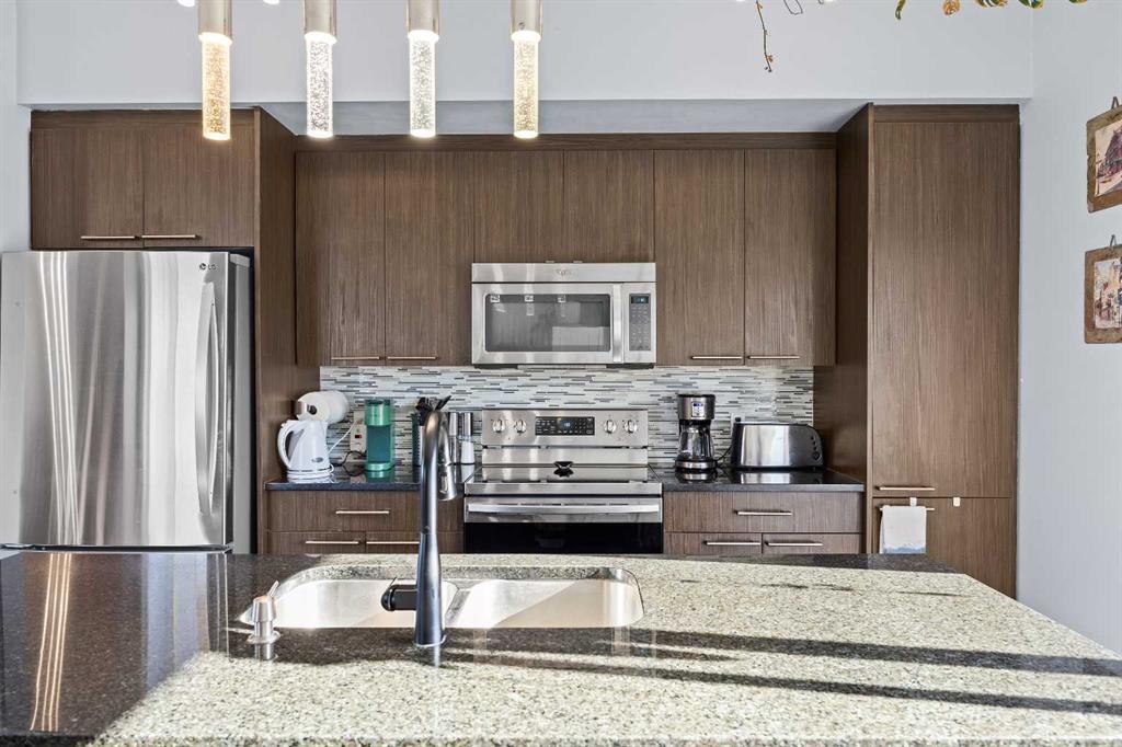 319 Taralake Way Ne, Calgary, AB - Indoor Photo Showing Kitchen With Double Sink