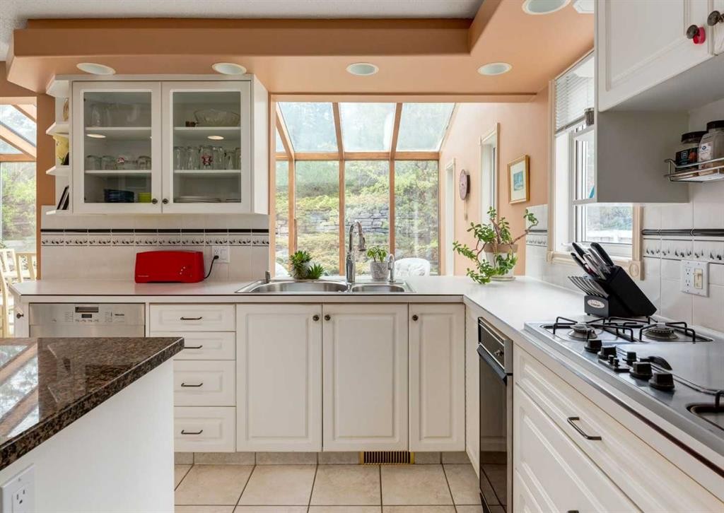 164 Hawksbrow Drive Nw, Calgary, AB - Indoor Photo Showing Kitchen With Double Sink