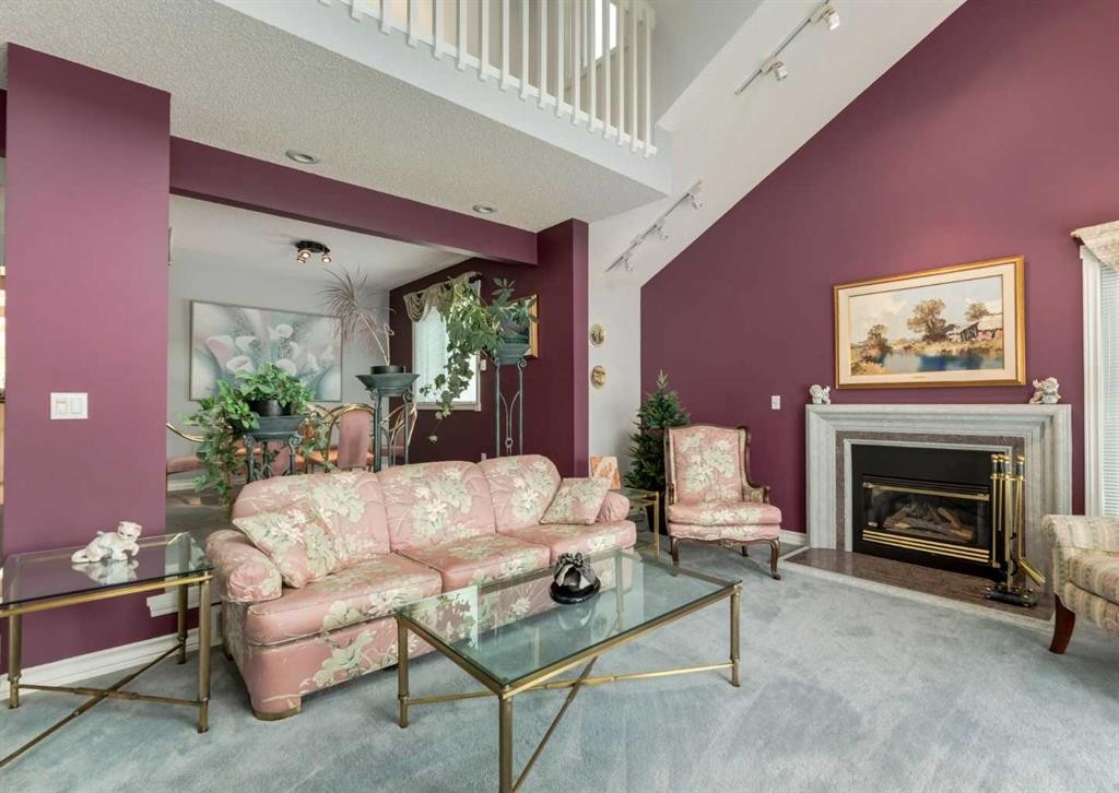 164 Hawksbrow Drive Nw, Calgary, AB - Indoor Photo Showing Living Room With Fireplace