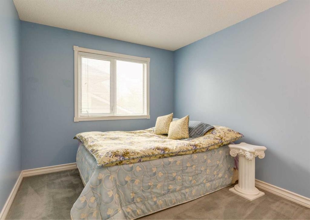 164 Hawksbrow Drive Nw, Calgary, AB - Indoor Photo Showing Bedroom
