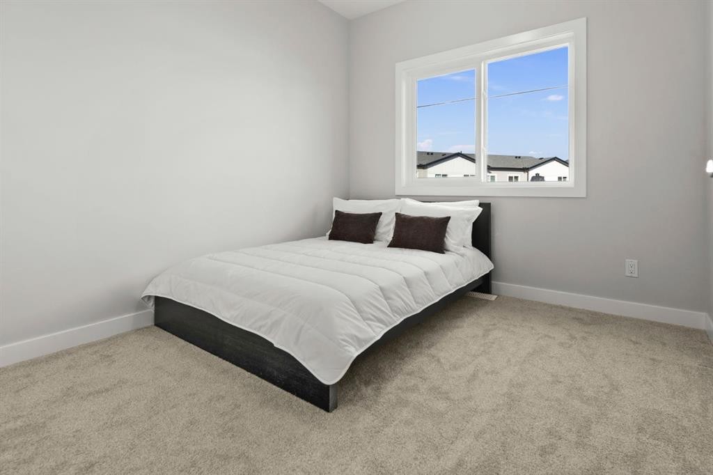 64-351 Monteith Drive Se, High River, AB - Indoor Photo Showing Bedroom