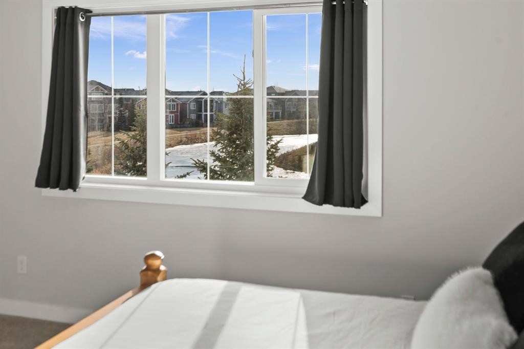 64-351 Monteith Drive Se, High River, AB - Indoor Photo Showing Bedroom