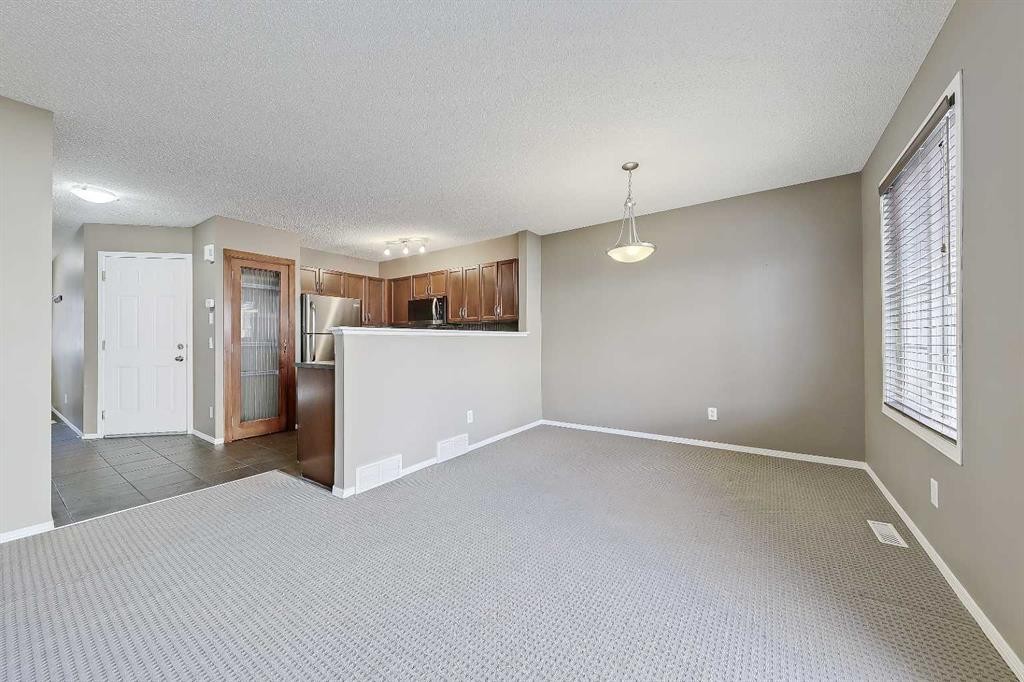 161 Eversyde Common Sw, Calgary, AB - Indoor Photo Showing Other Room