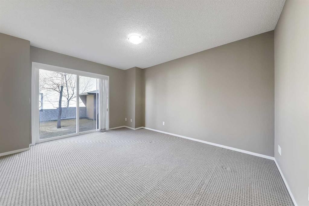 161 Eversyde Common Sw, Calgary, AB - Indoor Photo Showing Other Room