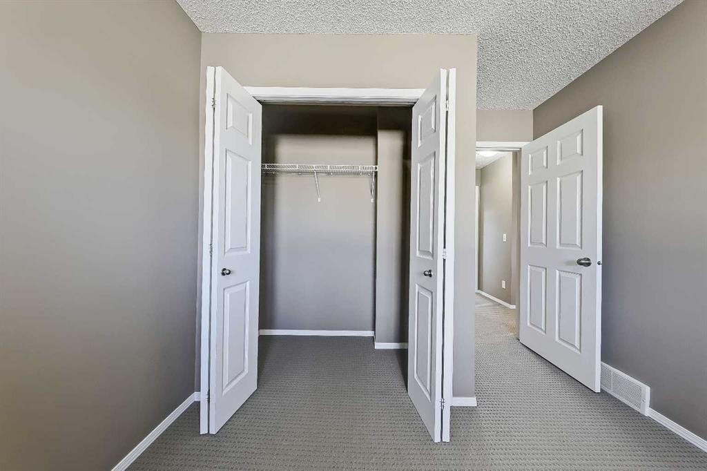 161 Eversyde Common Sw, Calgary, AB - Indoor Photo Showing Other Room
