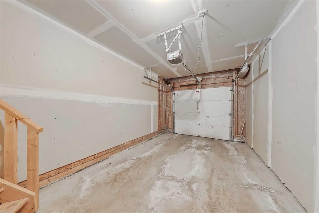 161 Eversyde Common Sw, Calgary, AB - Indoor Photo Showing Garage