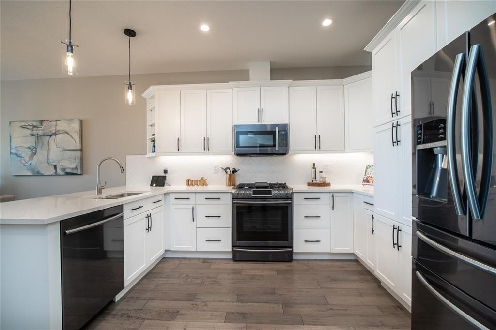 1103 Cornerstone Crescent, Olds, AB - Indoor Photo Showing Kitchen With Upgraded Kitchen