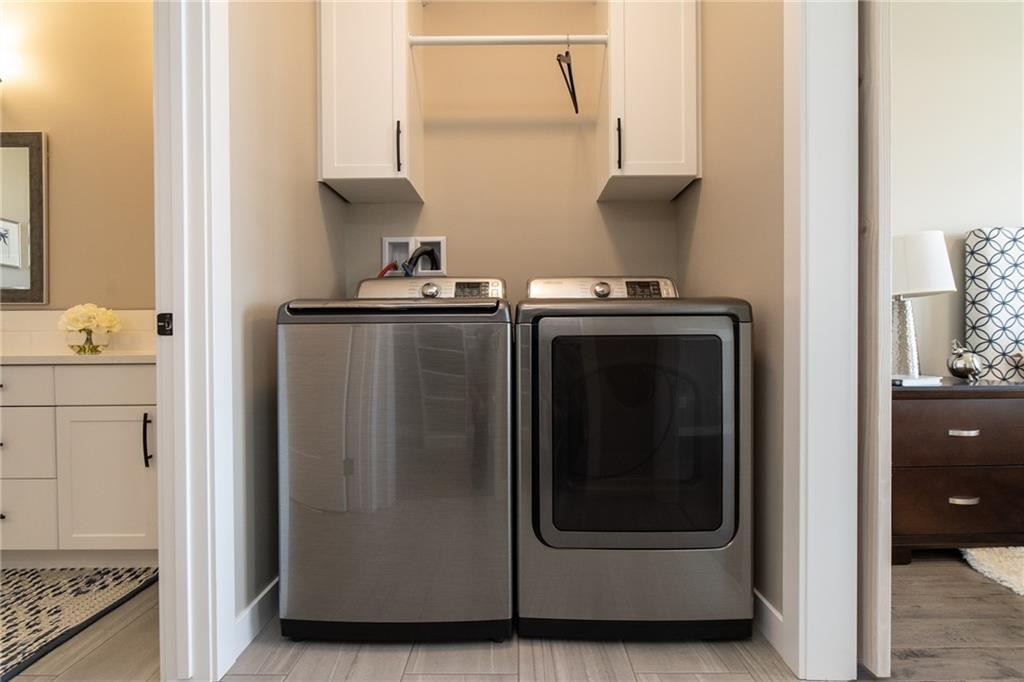 1103 Cornerstone Crescent, Olds, AB - Indoor Photo Showing Laundry Room