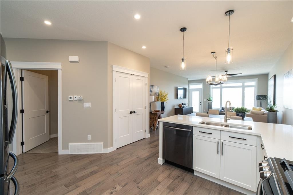 1103 Cornerstone Crescent, Olds, AB - Indoor Photo Showing Kitchen With Double Sink With Upgraded Kitchen