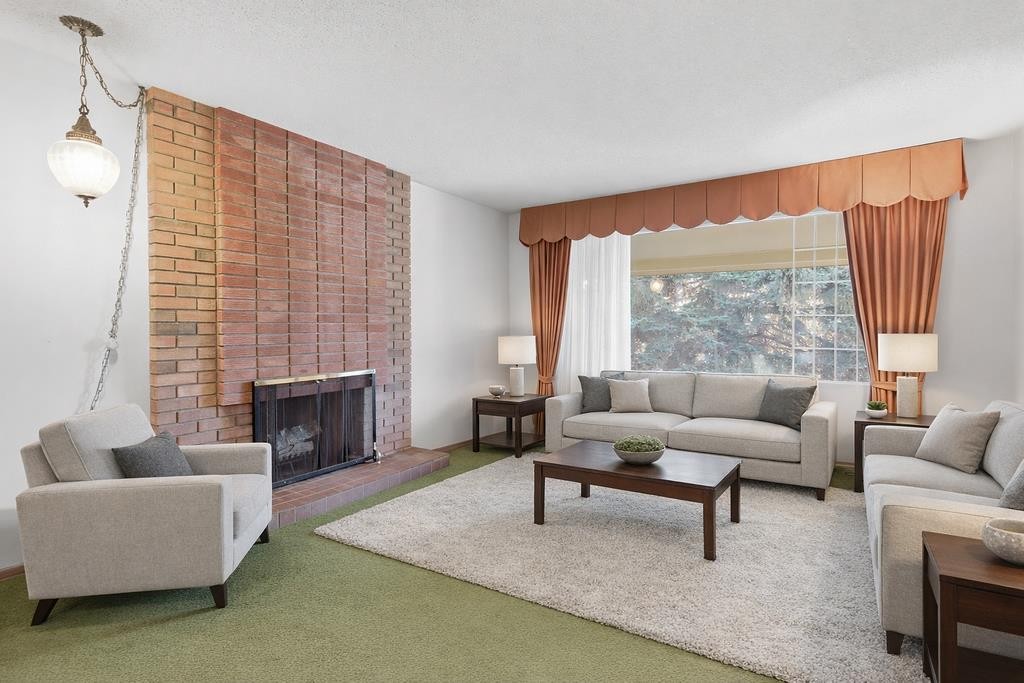5516 Dalhart Hill Nw, Calgary, AB - Indoor Photo Showing Living Room With Fireplace