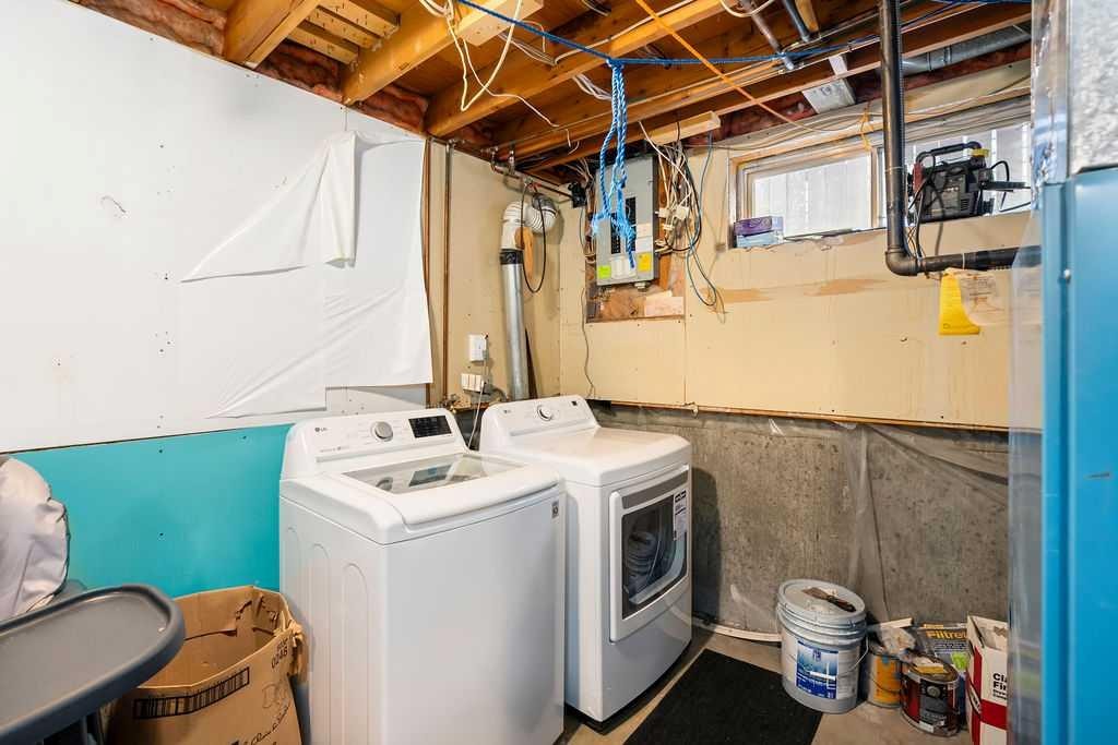 74 Castledale Way Ne, Calgary, AB - Indoor Photo Showing Laundry Room