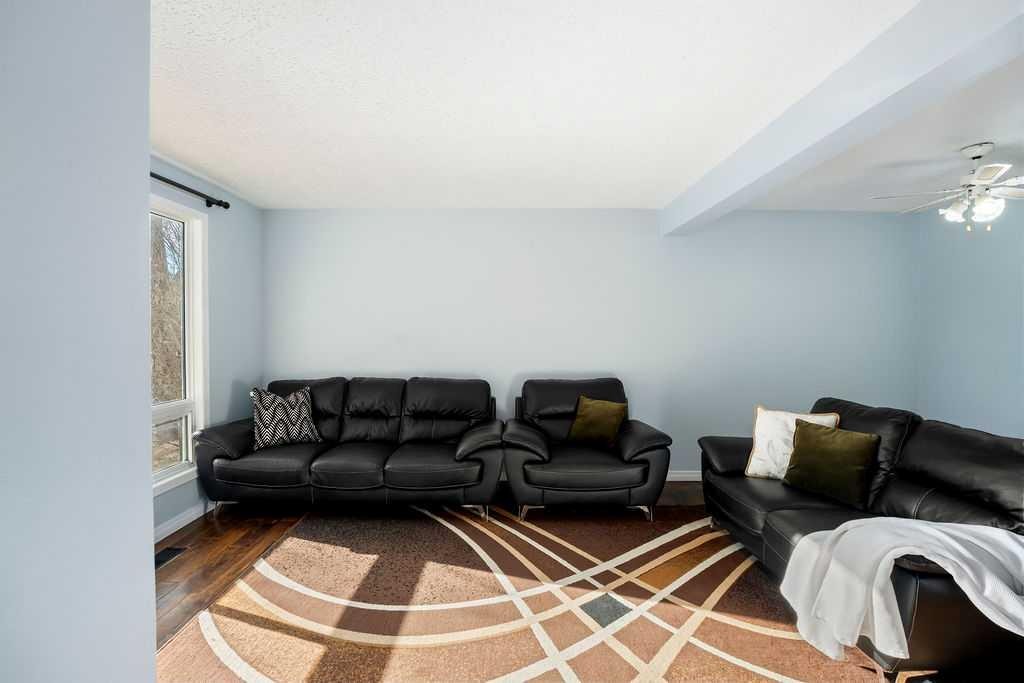 74 Castledale Way Ne, Calgary, AB - Indoor Photo Showing Living Room