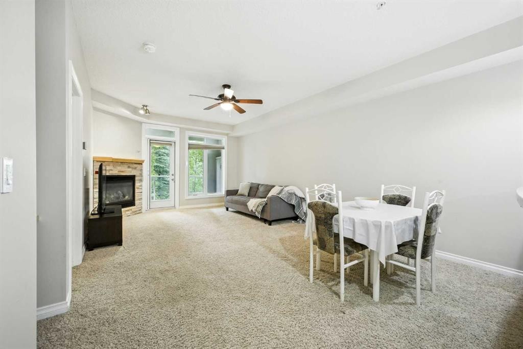 8103-14 Hemlock Crescent Sw, Calgary, AB - Indoor With Fireplace