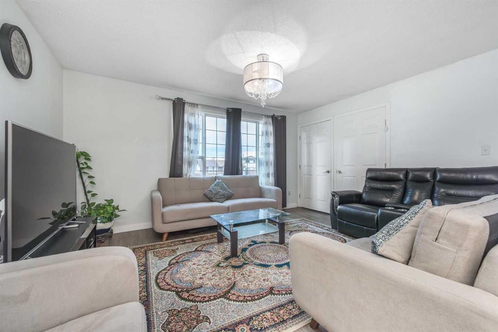 144 Rundleson Place Ne, Calgary, AB - Indoor Photo Showing Living Room