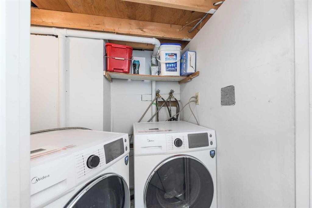 144 Rundleson Place Ne, Calgary, AB - Indoor Photo Showing Laundry Room