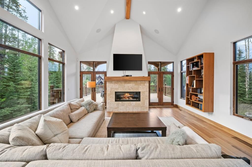 118 Cairns Landing, Canmore, AB - Indoor Photo Showing Living Room With Fireplace