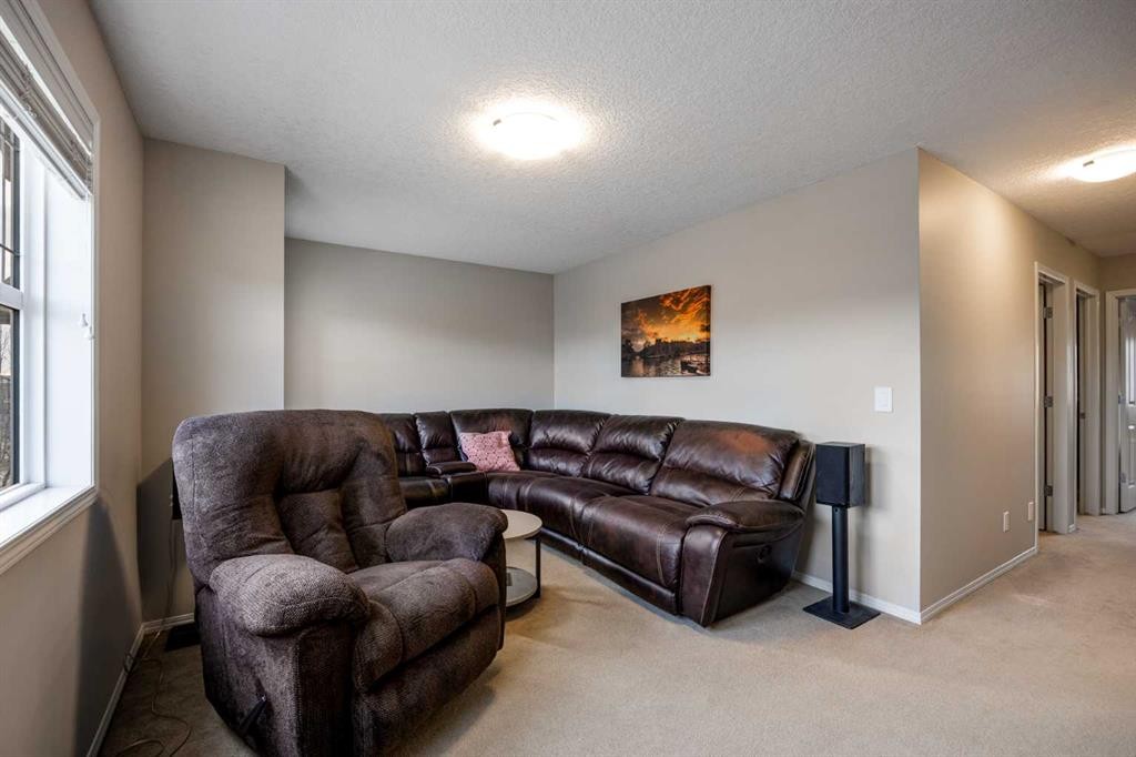 526 New Brighton Drive Se, Calgary, AB - Indoor Photo Showing Living Room