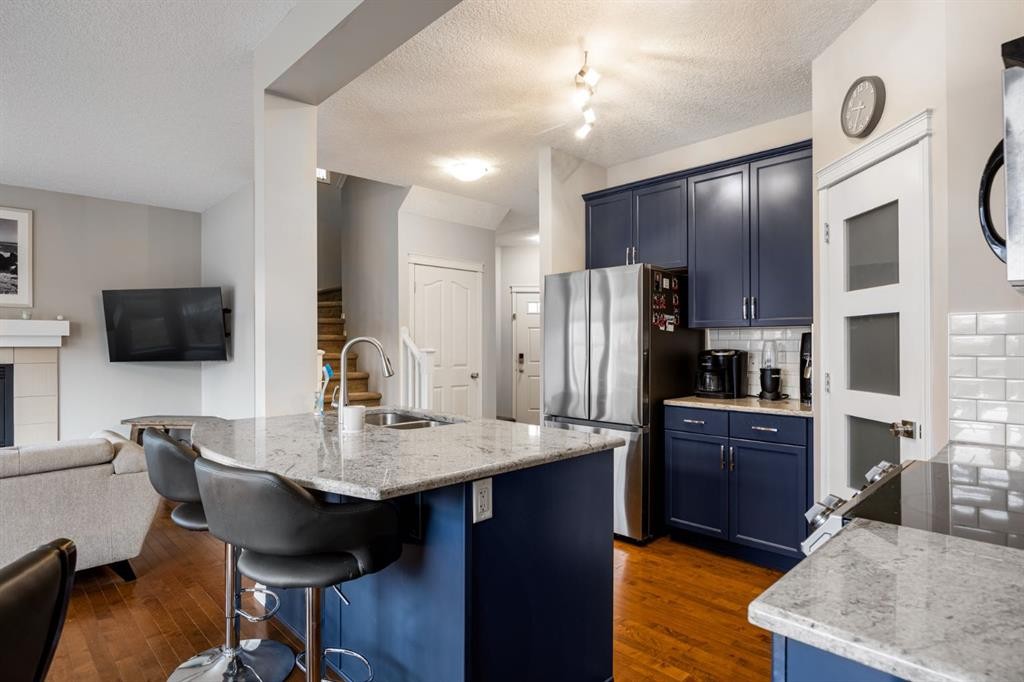 526 New Brighton Drive Se, Calgary, AB - Indoor Photo Showing Kitchen With Double Sink