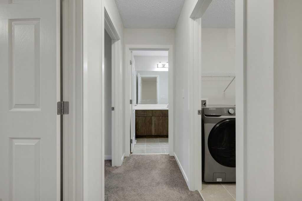 1465 148 Avenue Nw, Calgary, AB - Indoor Photo Showing Laundry Room