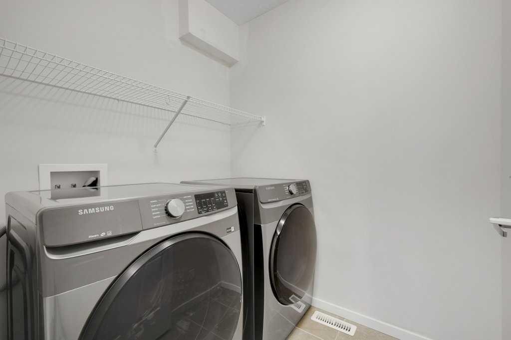 1465 148 Avenue Nw, Calgary, AB - Indoor Photo Showing Laundry Room