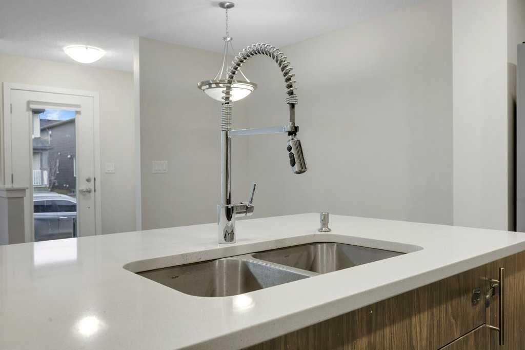 1465 148 Avenue Nw, Calgary, AB - Indoor Photo Showing Kitchen With Double Sink