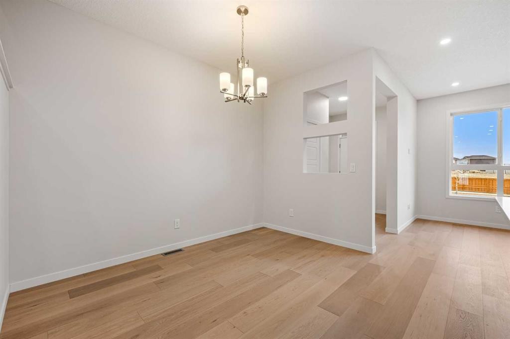 117 Bridgeport Gate, Chestermere, AB - Indoor Photo Showing Other Room