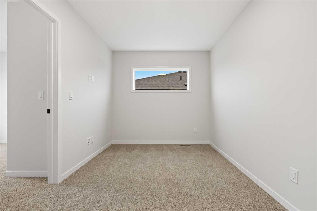 117 Bridgeport Gate, Chestermere, AB - Indoor Photo Showing Other Room