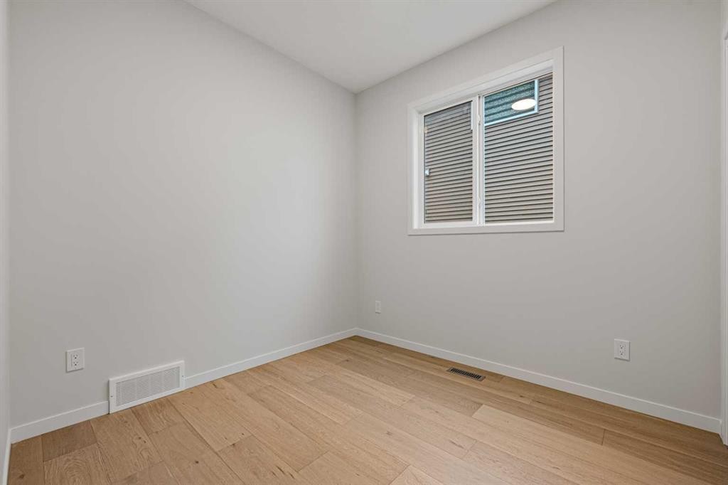 117 Bridgeport Gate, Chestermere, AB - Indoor Photo Showing Other Room