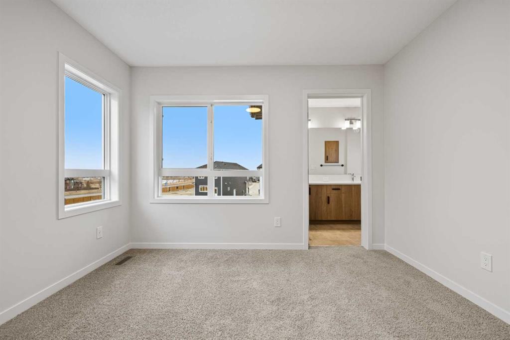 117 Bridgeport Gate, Chestermere, AB - Indoor Photo Showing Other Room