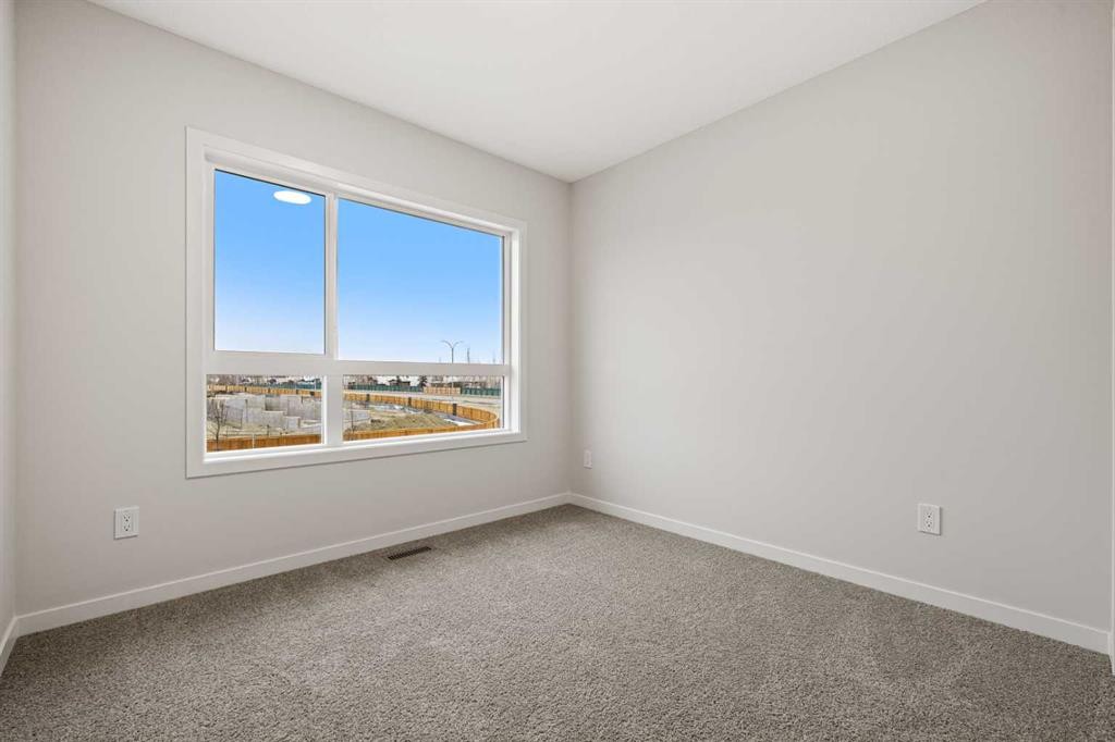 117 Bridgeport Gate, Chestermere, AB - Indoor Photo Showing Other Room