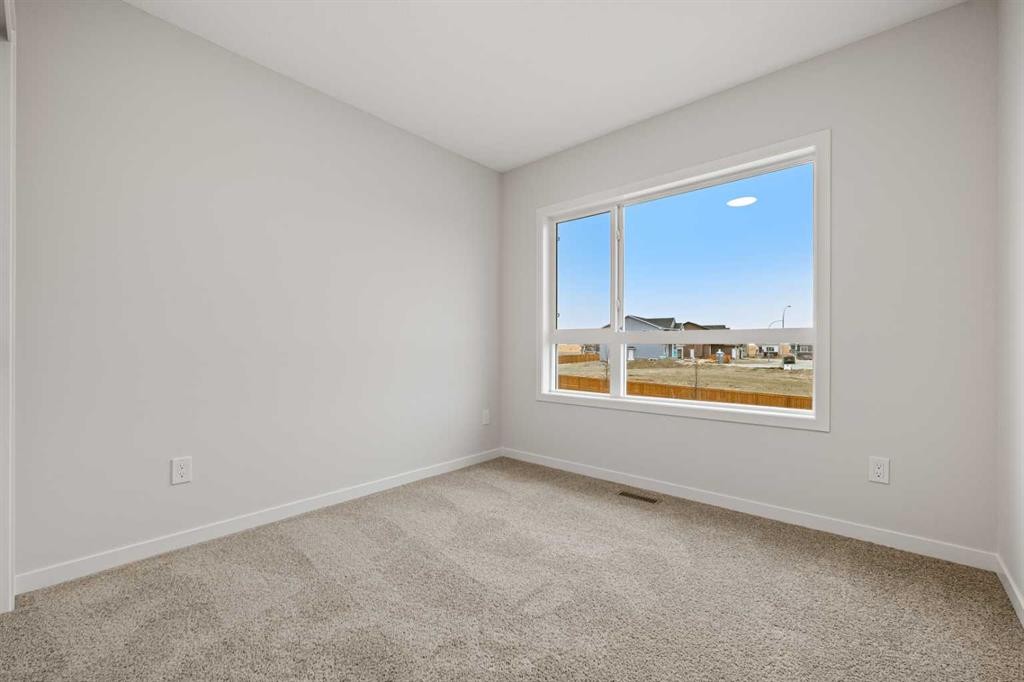 117 Bridgeport Gate, Chestermere, AB - Indoor Photo Showing Other Room