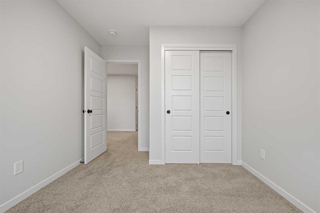 117 Bridgeport Gate, Chestermere, AB - Indoor Photo Showing Other Room