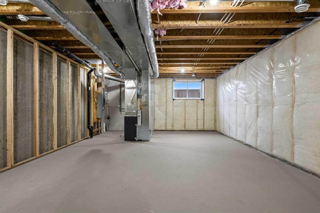 117 Bridgeport Gate, Chestermere, AB - Indoor Photo Showing Basement