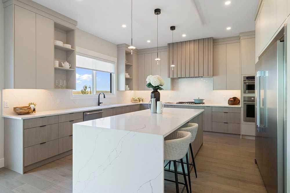 301 Limestone Bay, Balzac, AB - Indoor Photo Showing Kitchen With Upgraded Kitchen