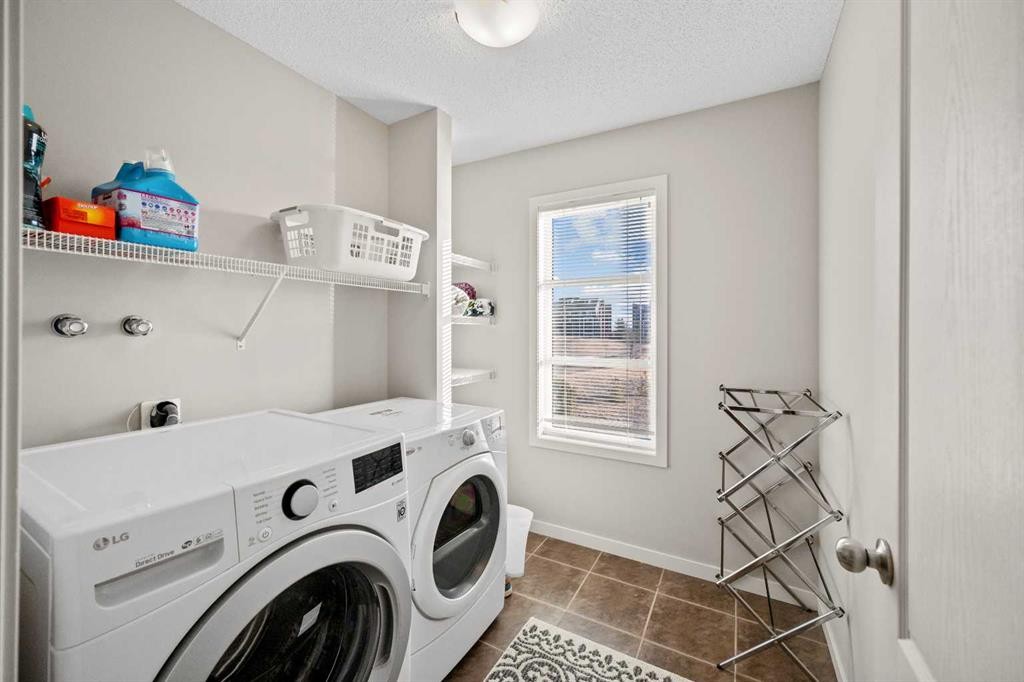 112 Copperpond Park, Calgary, AB - Indoor Photo Showing Laundry Room