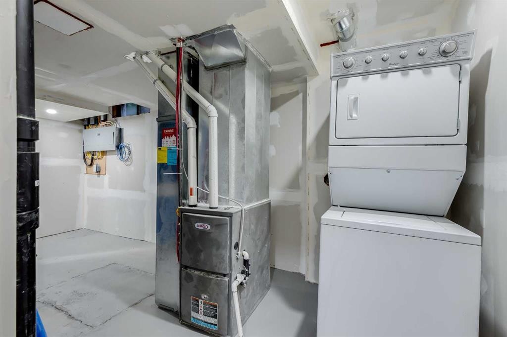 116 Deer Run Close Se, Calgary, AB - Indoor Photo Showing Laundry Room