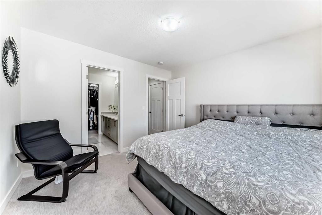 240 Copperleaf Way Se, Calgary, AB - Indoor Photo Showing Bedroom