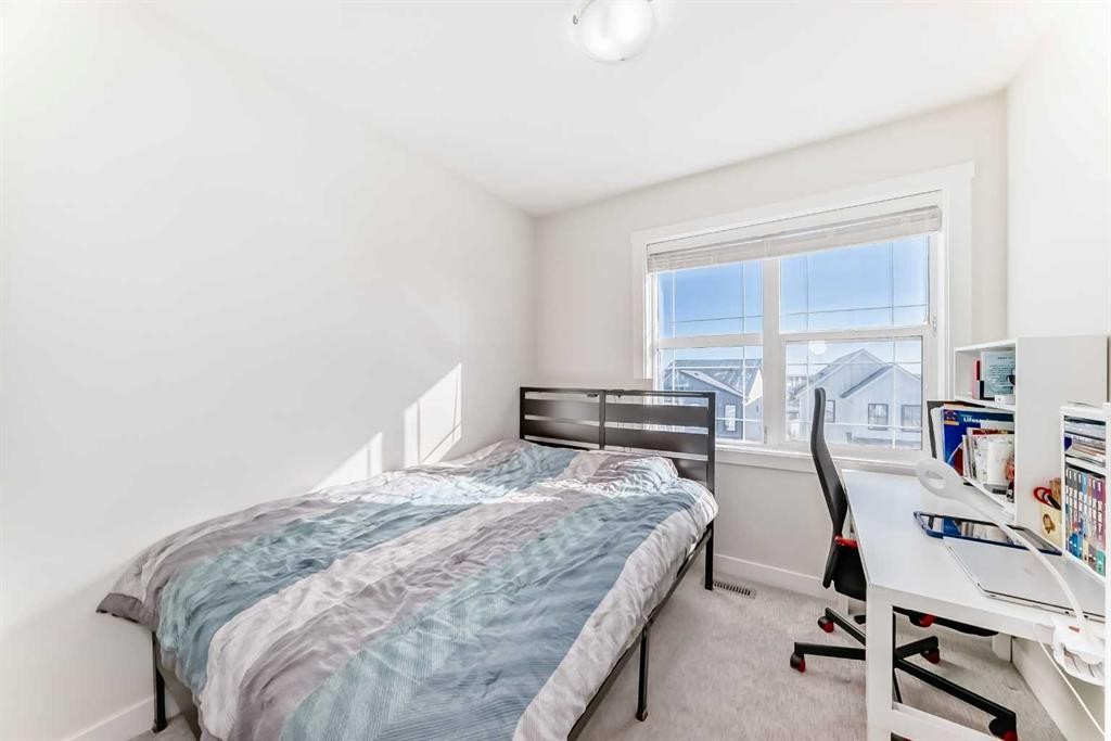240 Copperleaf Way Se, Calgary, AB - Indoor Photo Showing Bedroom