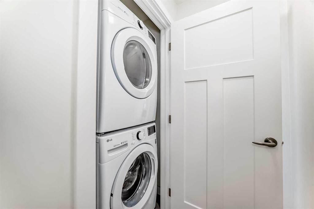 240 Copperleaf Way Se, Calgary, AB - Indoor Photo Showing Laundry Room