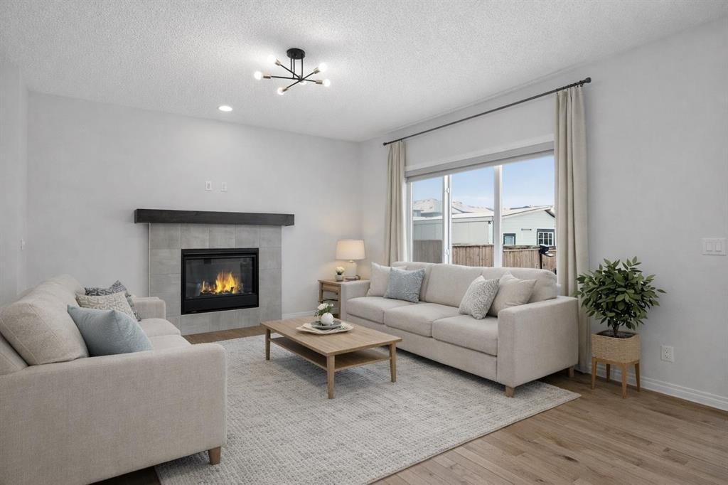 114 Walgrove Green Se, Calgary, AB - Indoor Photo Showing Living Room With Fireplace