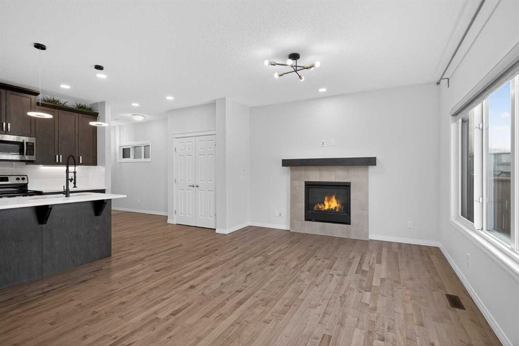 114 Walgrove Green Se, Calgary, AB - Indoor With Fireplace
