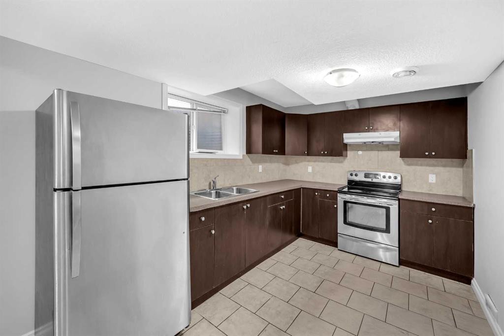 422 Taralake Way Ne, Calgary, AB - Indoor Photo Showing Kitchen With Double Sink