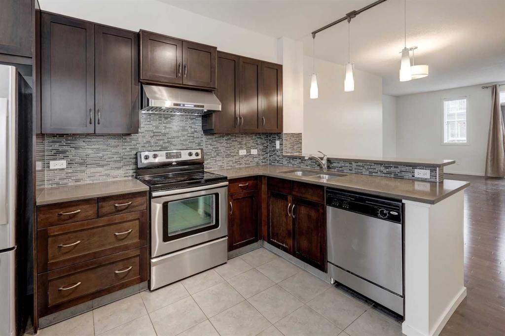 68 Evansview Road Nw, Calgary, AB - Indoor Photo Showing Kitchen With Stainless Steel Kitchen With Double Sink