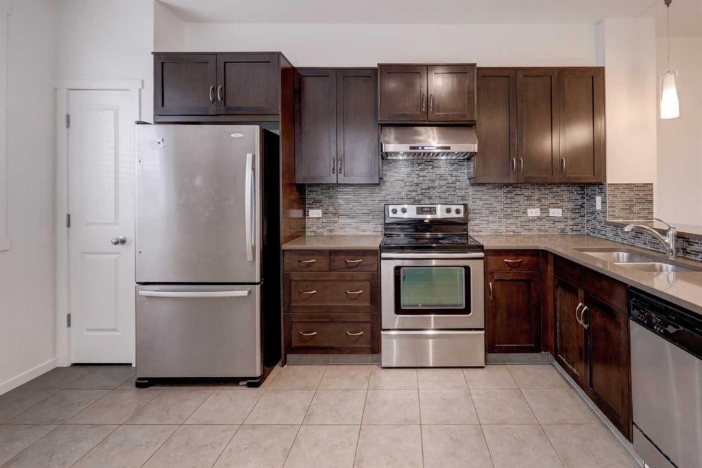 68 Evansview Road Nw, Calgary, AB - Indoor Photo Showing Kitchen With Stainless Steel Kitchen With Double Sink