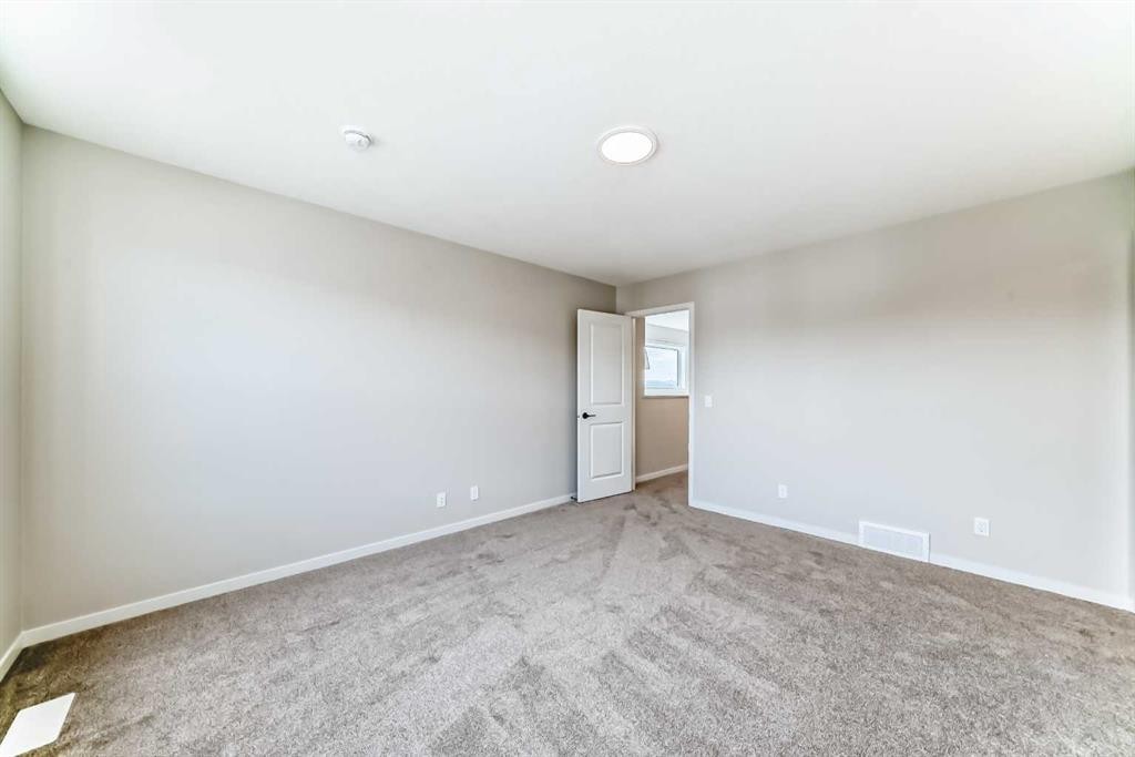 35 Bartlett Crescent Se, Calgary, AB - Indoor Photo Showing Other Room