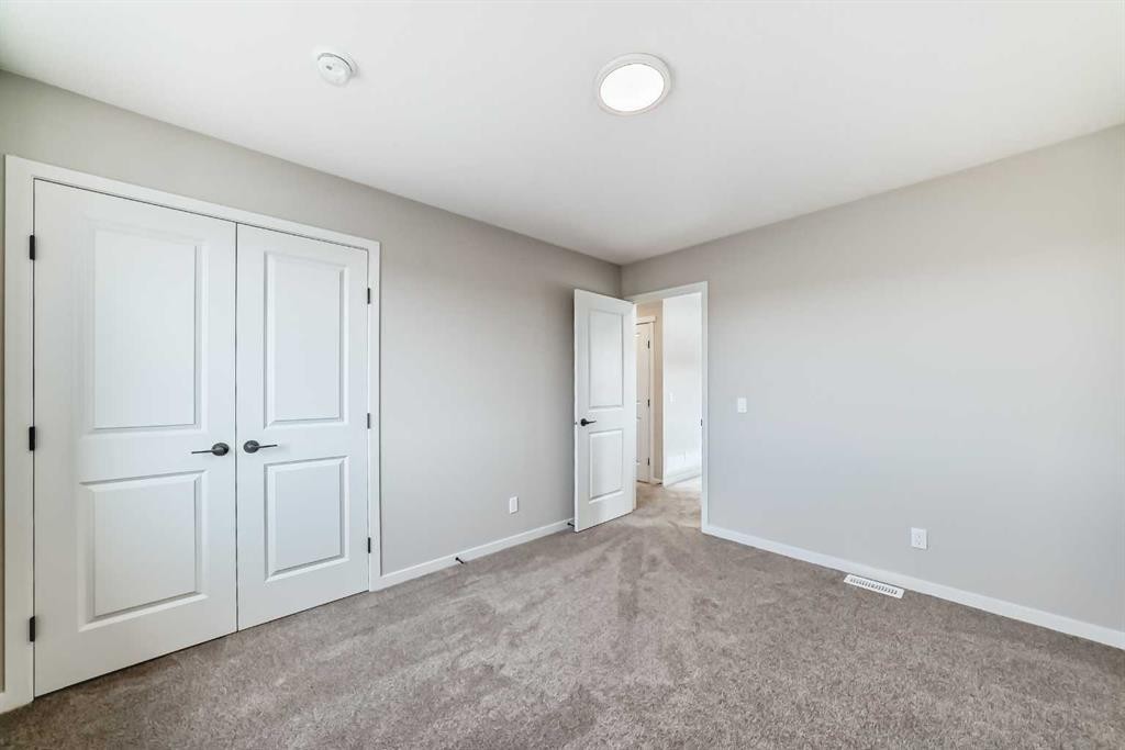 35 Bartlett Crescent Se, Calgary, AB - Indoor Photo Showing Other Room