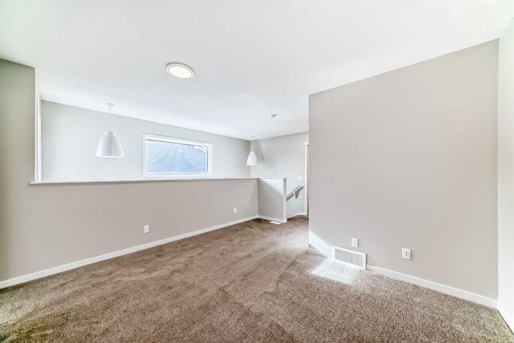 35 Bartlett Crescent Se, Calgary, AB - Indoor Photo Showing Other Room