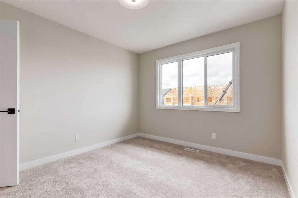 178 Greystone Boulevard, Cochrane, AB - Indoor Photo Showing Other Room