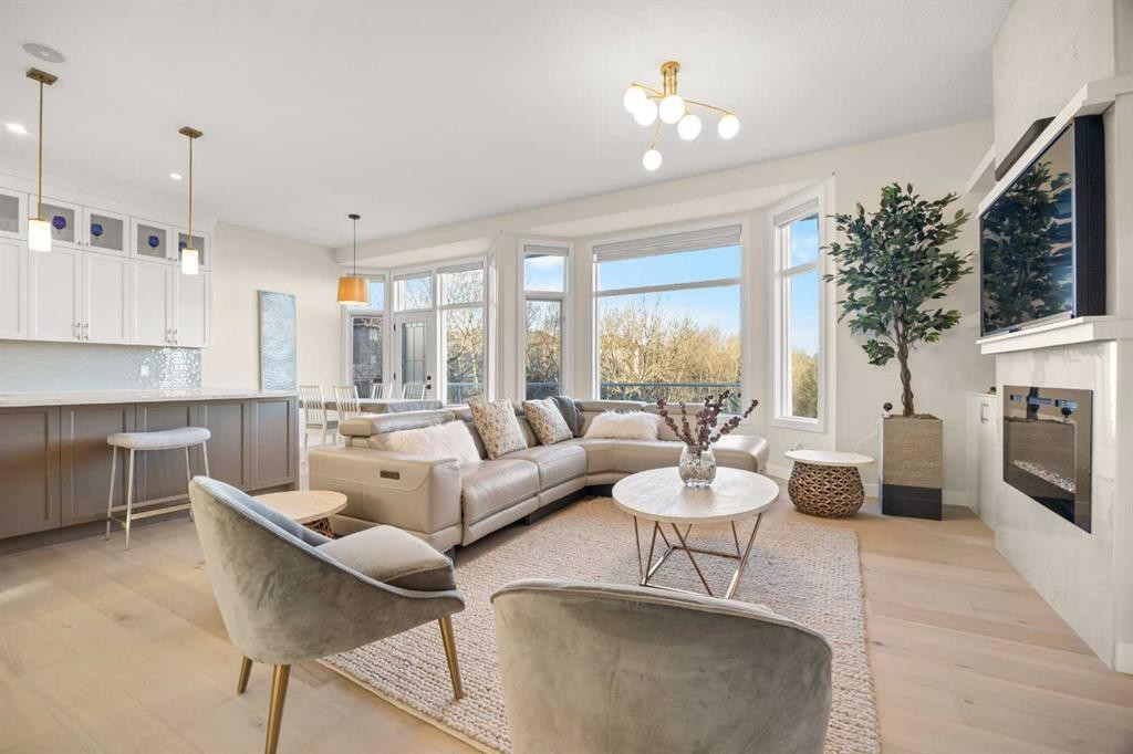 271 Hamptons Terrace Nw, Calgary, AB - Indoor Photo Showing Living Room With Fireplace